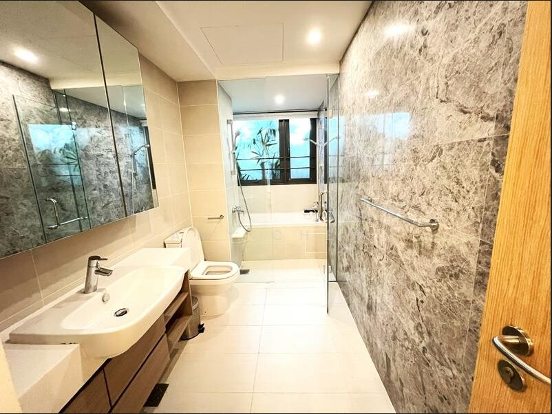 Marble bathroom with a bathtub, walk-in shower and twin basin