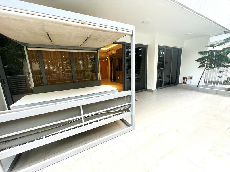The terrace seen along its length, with the pergola and sliding doors into the apartment